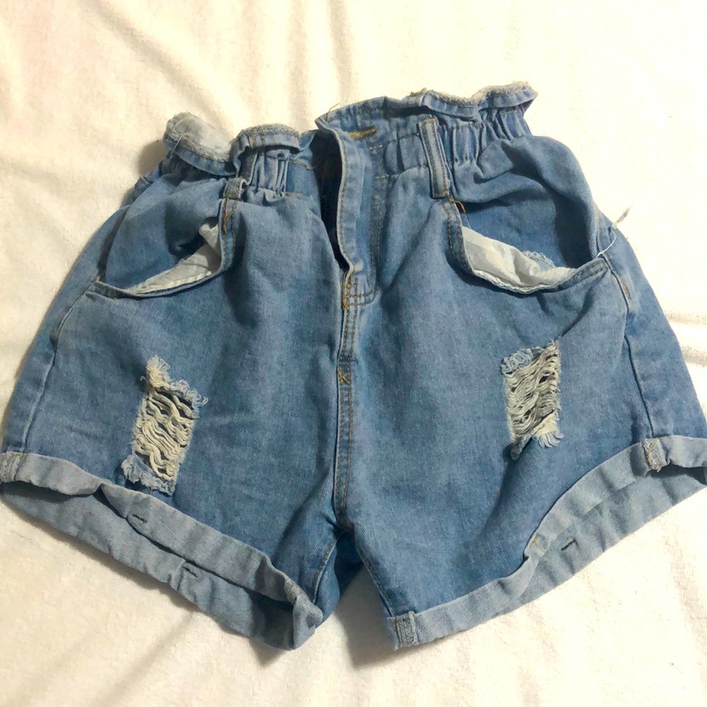 High waisted paper bag style elastic waist shorts.